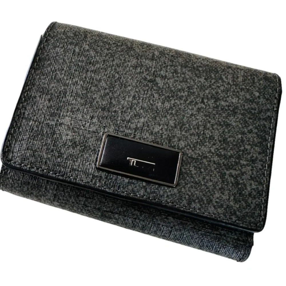 Tumi Crafted from leather, this refined and durable tri-fold wallet offers super